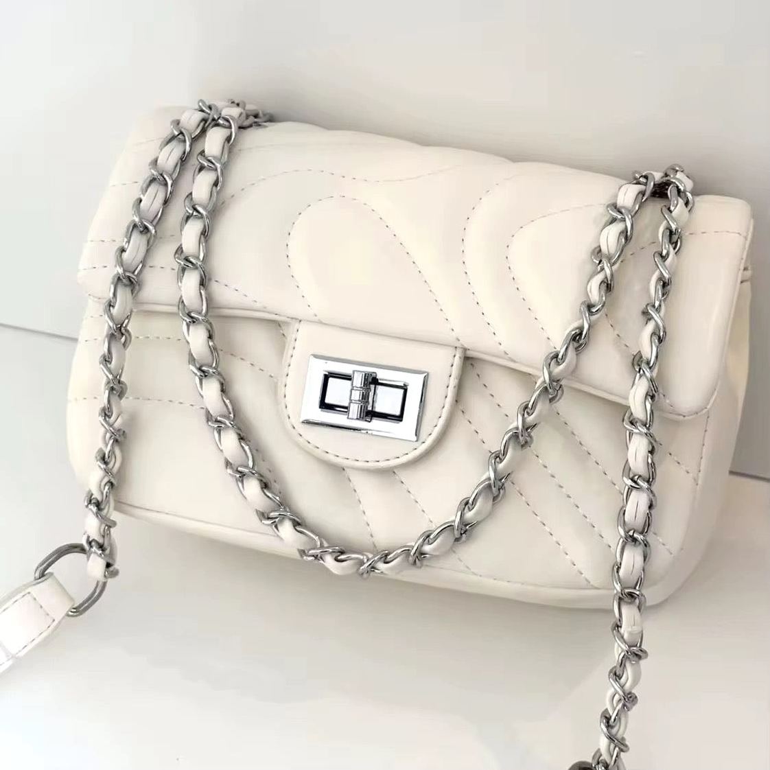 Prestige crossbody bag with silver link strap